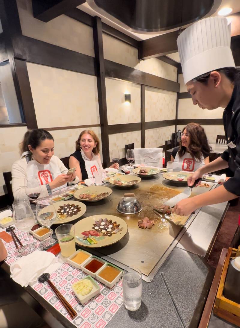 Travel experience showing japanese chef serving local food